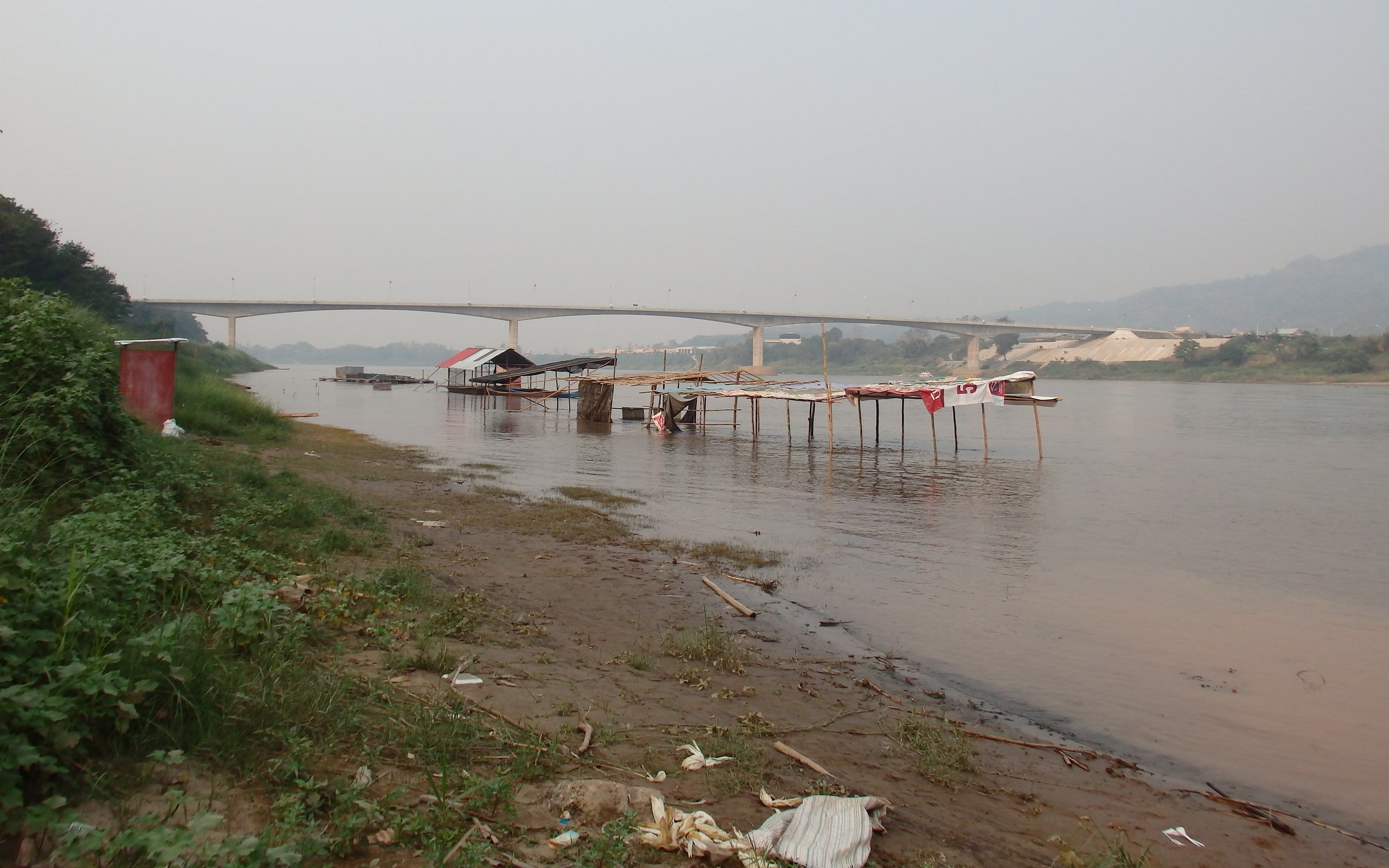 The Mekong and the Fourth Friendship Bridge in the distance, seen from the Chiang Khong bank