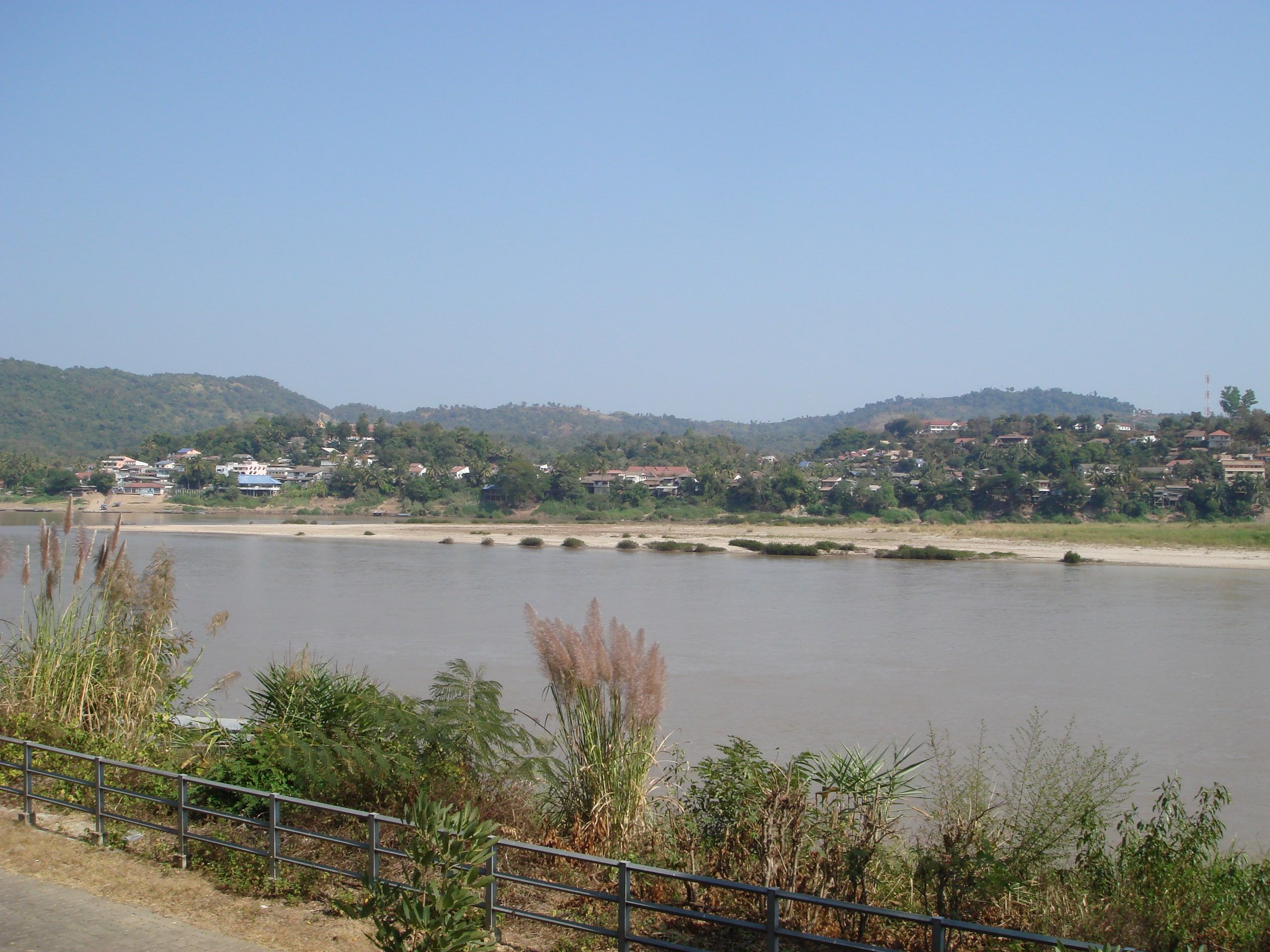 The wide, calm Mekong in front of Huay Xai, the Thai hills opposite