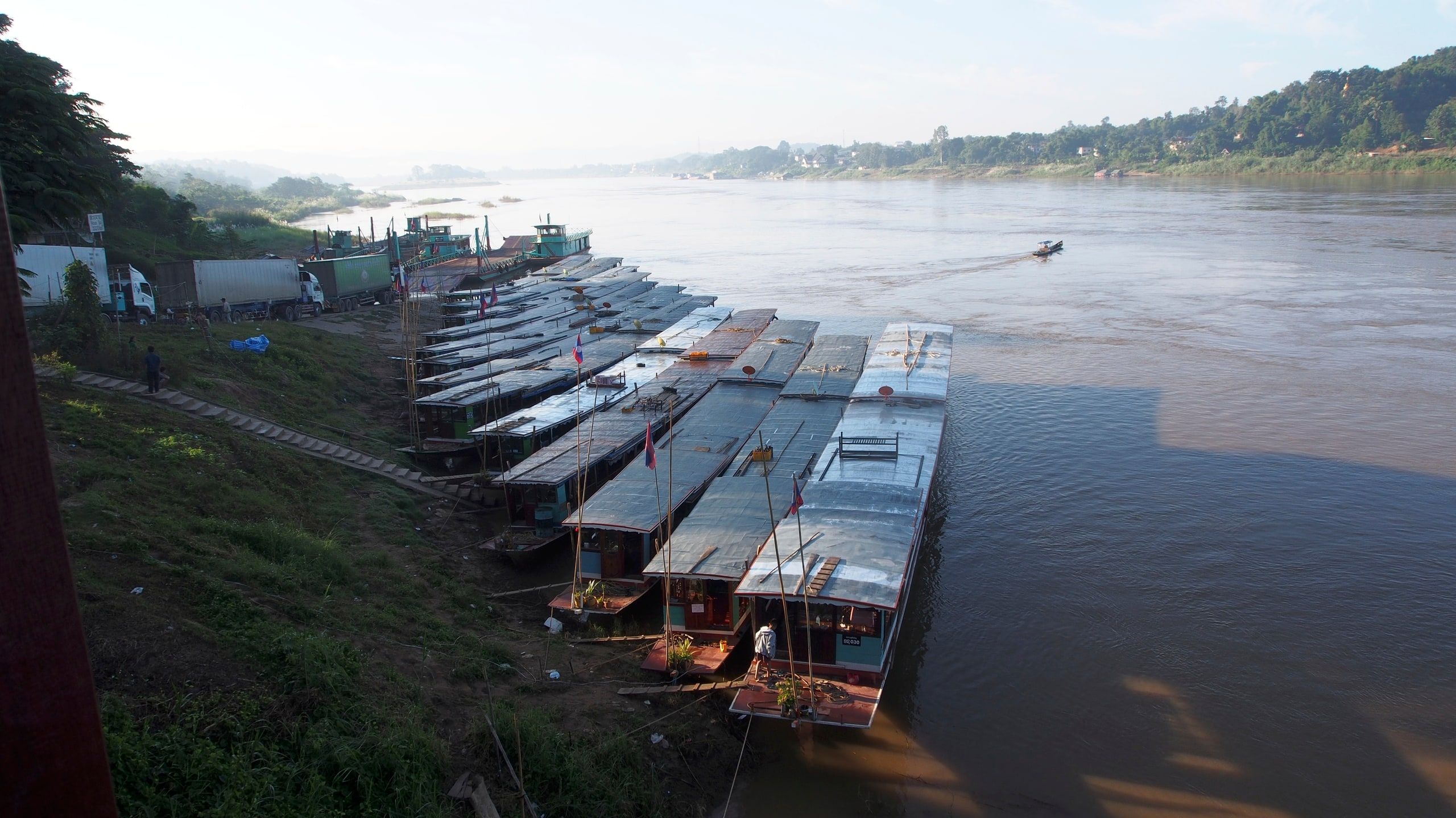 Slow boats lined up at the Huay Xai pier on the Mekong