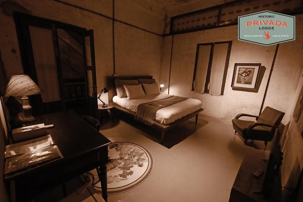 A room at Privada Lodge, period furniture and soft light