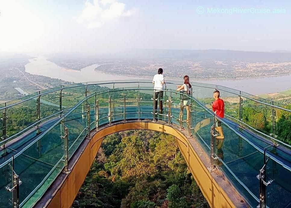 The glass skywalk at Wat Pha Tak Suea above the Mekong and the Lao bank