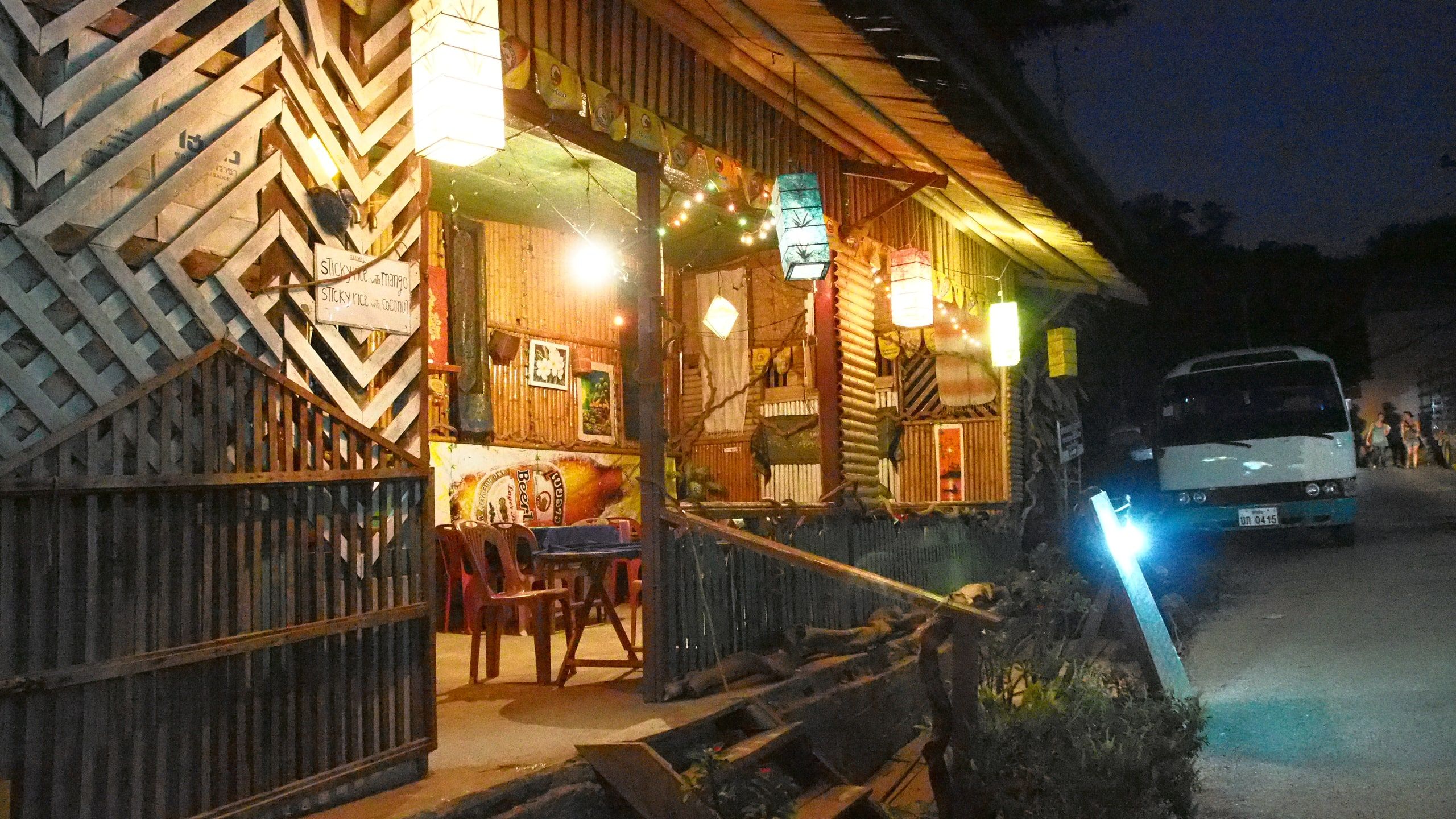 The lit terrace of a Pakbeng restaurant in the evening