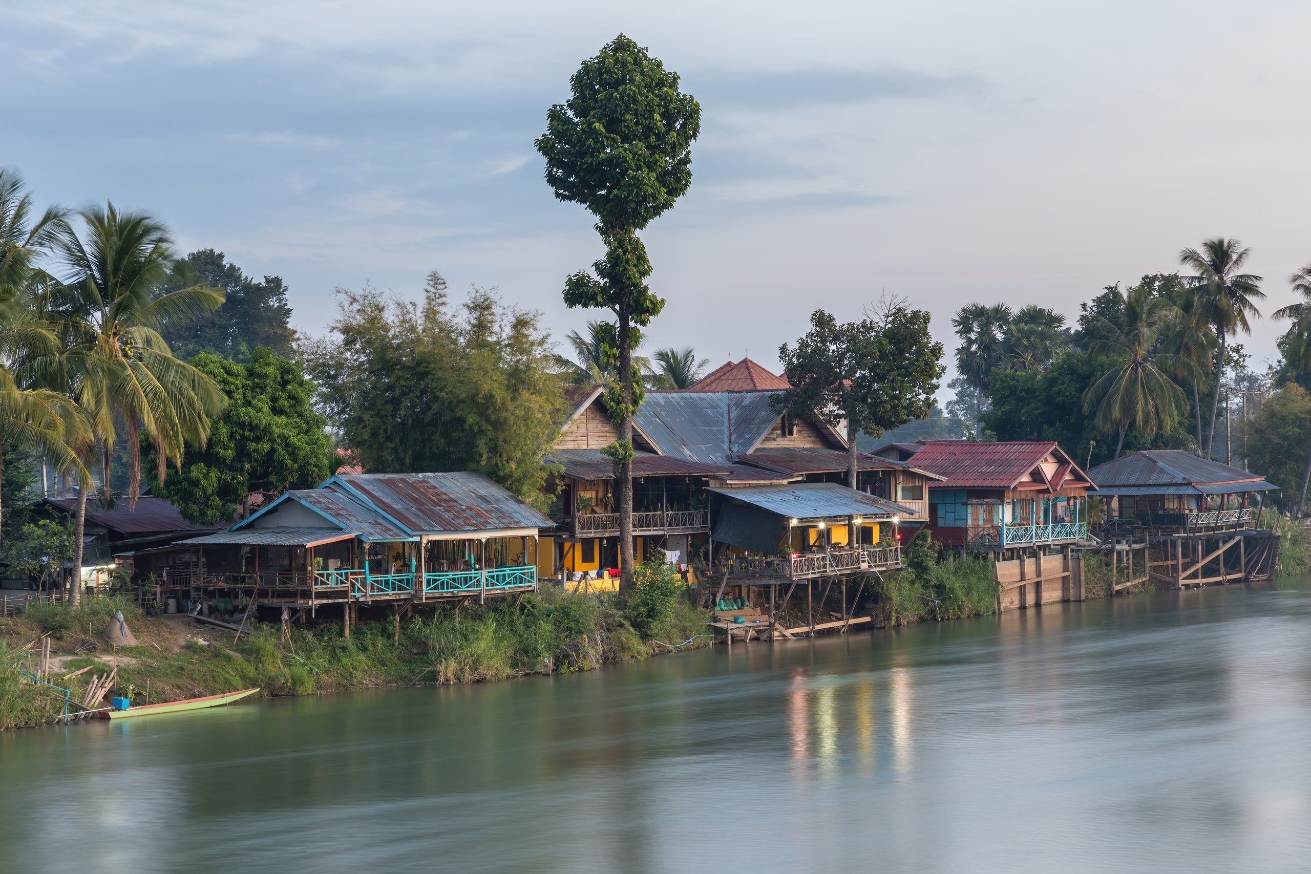 Don Det houses on the Mekong, seen from the bridge to Don Khon at dawn